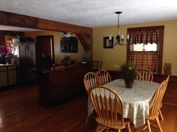 45 Sassawanna Road Rutland, MA 01543 - Photo 6 of 27 a view of a dining room with furniture window and wooden floor