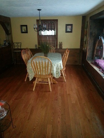 45 Sassawanna Road Rutland, MA 01543 - Photo 7 of 27 a living room with furniture and a flat screen tv