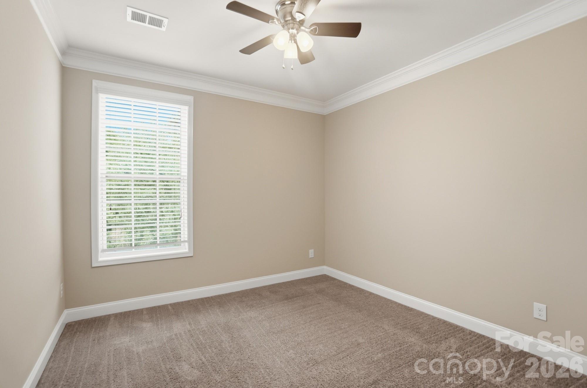 9407 Inverness Bay Road Charlotte, NC 28278 - Photo 23 of 29 a view of an empty room with a window