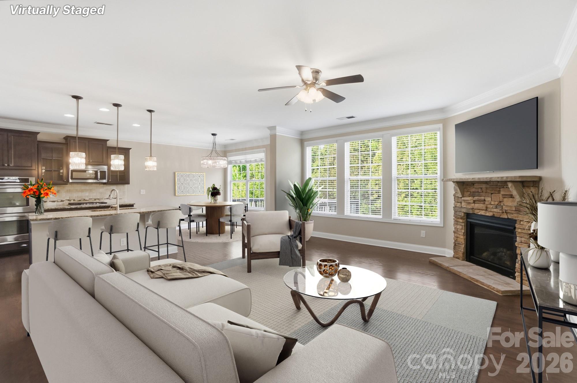 9407 Inverness Bay Road Charlotte, NC 28278 - Photo 6 of 29 a living room with furniture and a fireplace
