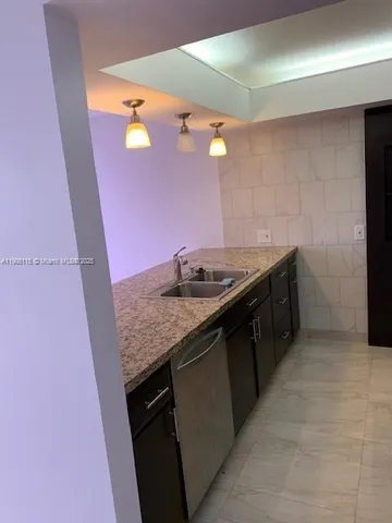 a view of swimming pool with outdoor seating