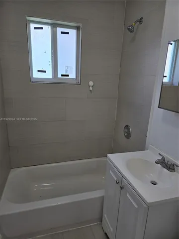 a bathroom with a bathtub