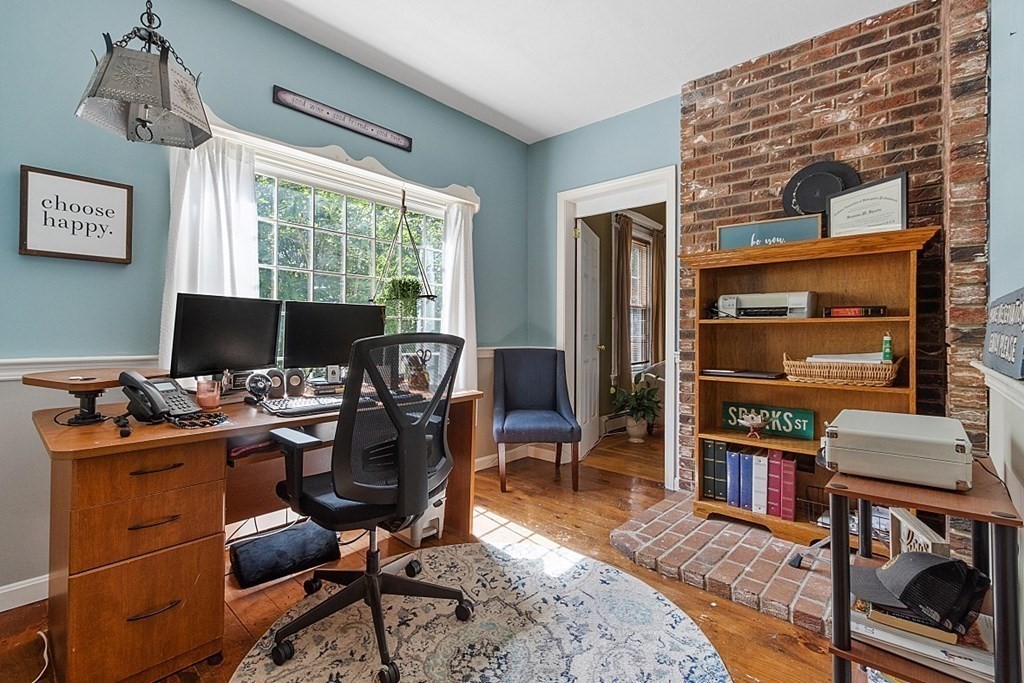 32 Ash Street Winchendon, MA 01475 - Photo 14 of 42 a view of a workspace with furniture and a window
