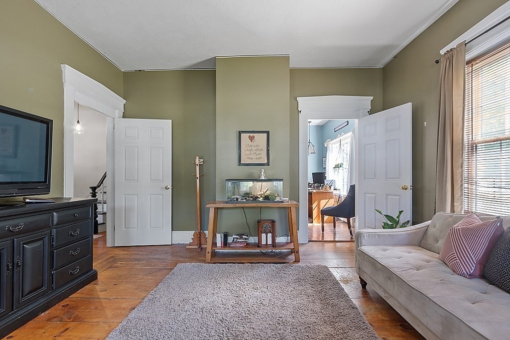 32 Ash Street Winchendon, MA 01475 - Photo 16 of 42 a living room with furniture and a flat screen tv