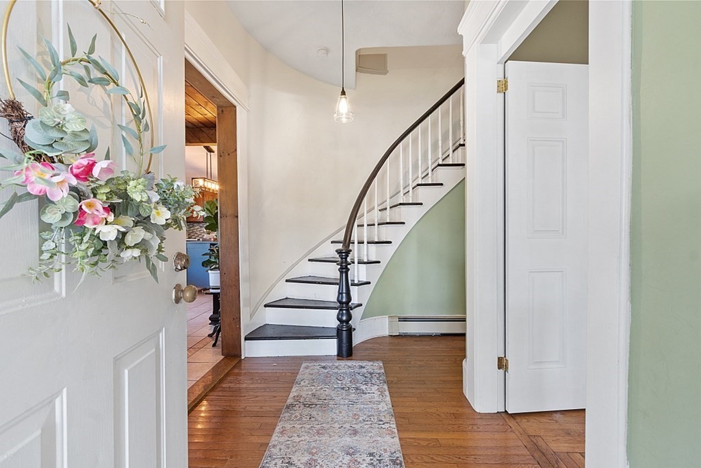 32 Ash Street Winchendon, MA 01475 - Photo 3 of 42 a view of entryway and hall with wooden floor