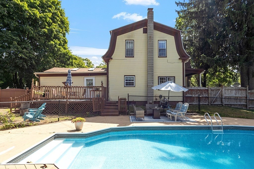 32 Ash Street Winchendon, MA 01475 - Photo 34 of 42 a front view of house with swimming pool yard and outdoor seating