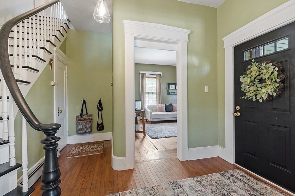32 Ash Street Winchendon, MA 01475 - Photo 4 of 42 a living room with furniture and a mirror