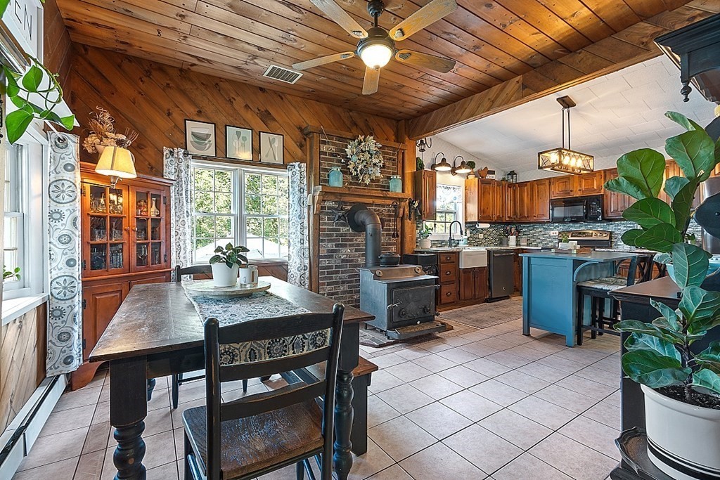 32 Ash Street Winchendon, MA 01475 - Photo 5 of 42 a view of a dining room with furniture window and wooden floor