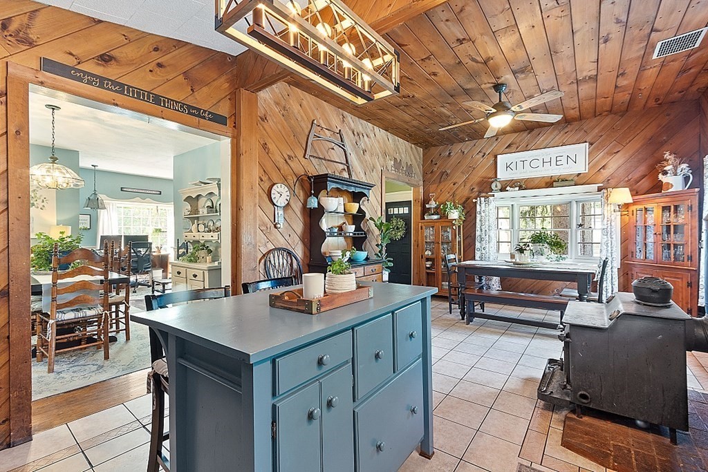 32 Ash Street Winchendon, MA 01475 - Photo 7 of 42 a living room with stainless steel appliances kitchen island granite countertop lots of furniture and a large window