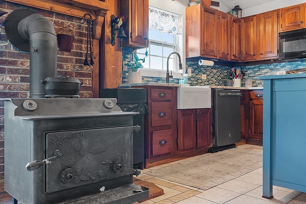 32 Ash Street Winchendon, MA 01475 - Photo 10 of 42 a kitchen with a sink and a cabinets
