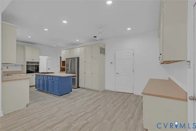 a view of kitchen with wooden floor