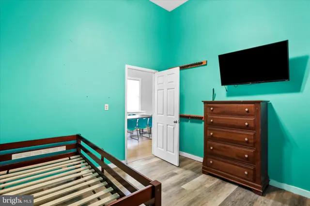 a room with furniture and a flat screen tv