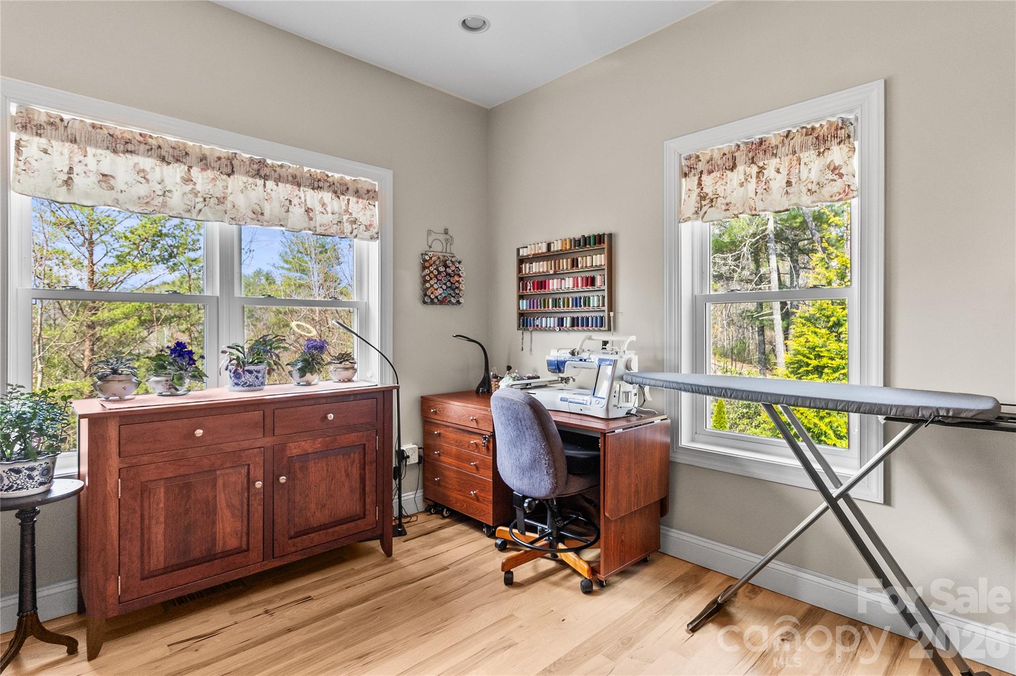 1103 River Ridge Way Lenoir, NC 28645 - Photo 31 of 46 a view of a workspace with furniture and a window