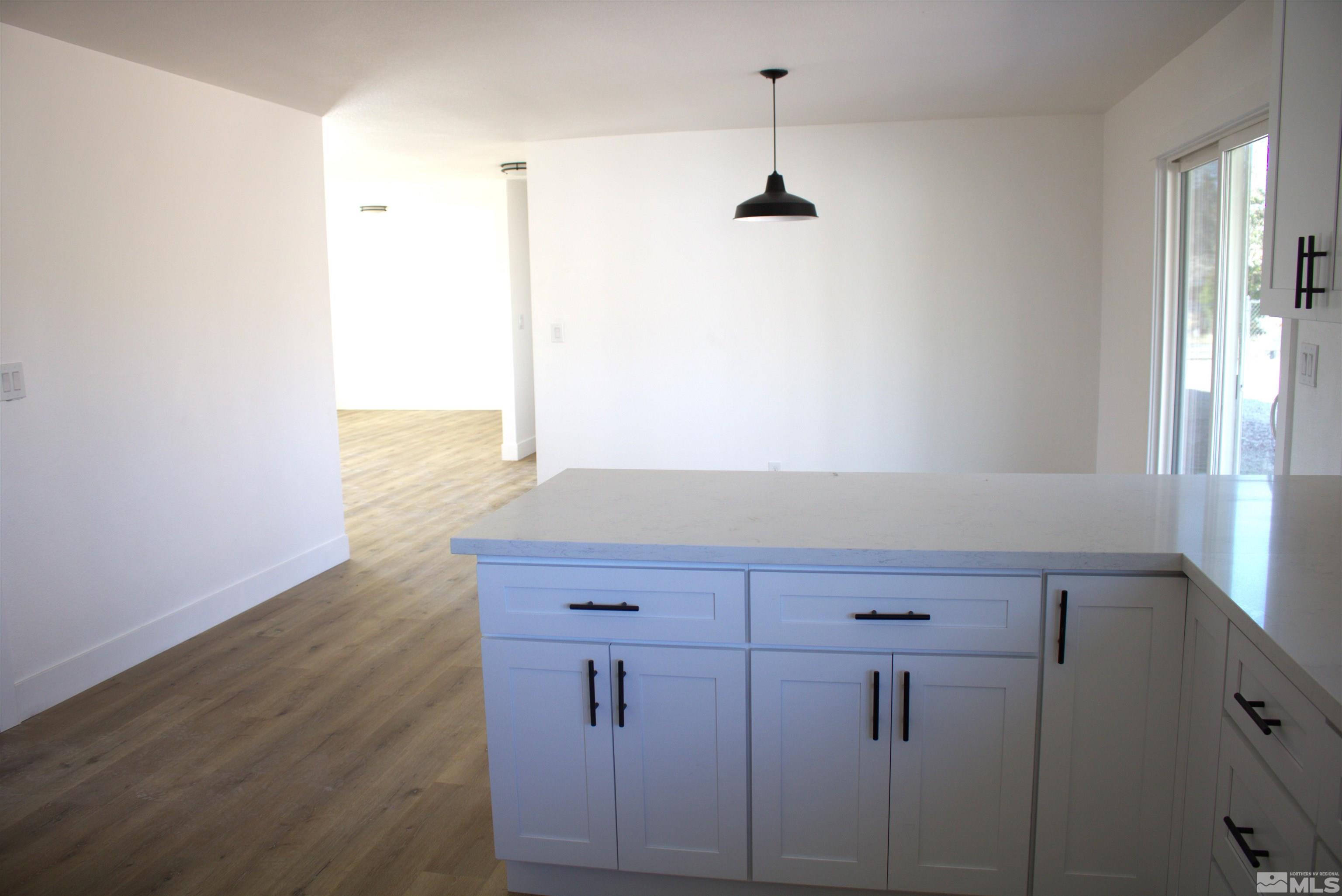 1445 Newcomer Lane Reno, NV 89506 - Photo 6 of 26 a view of cabinets with wooden floor