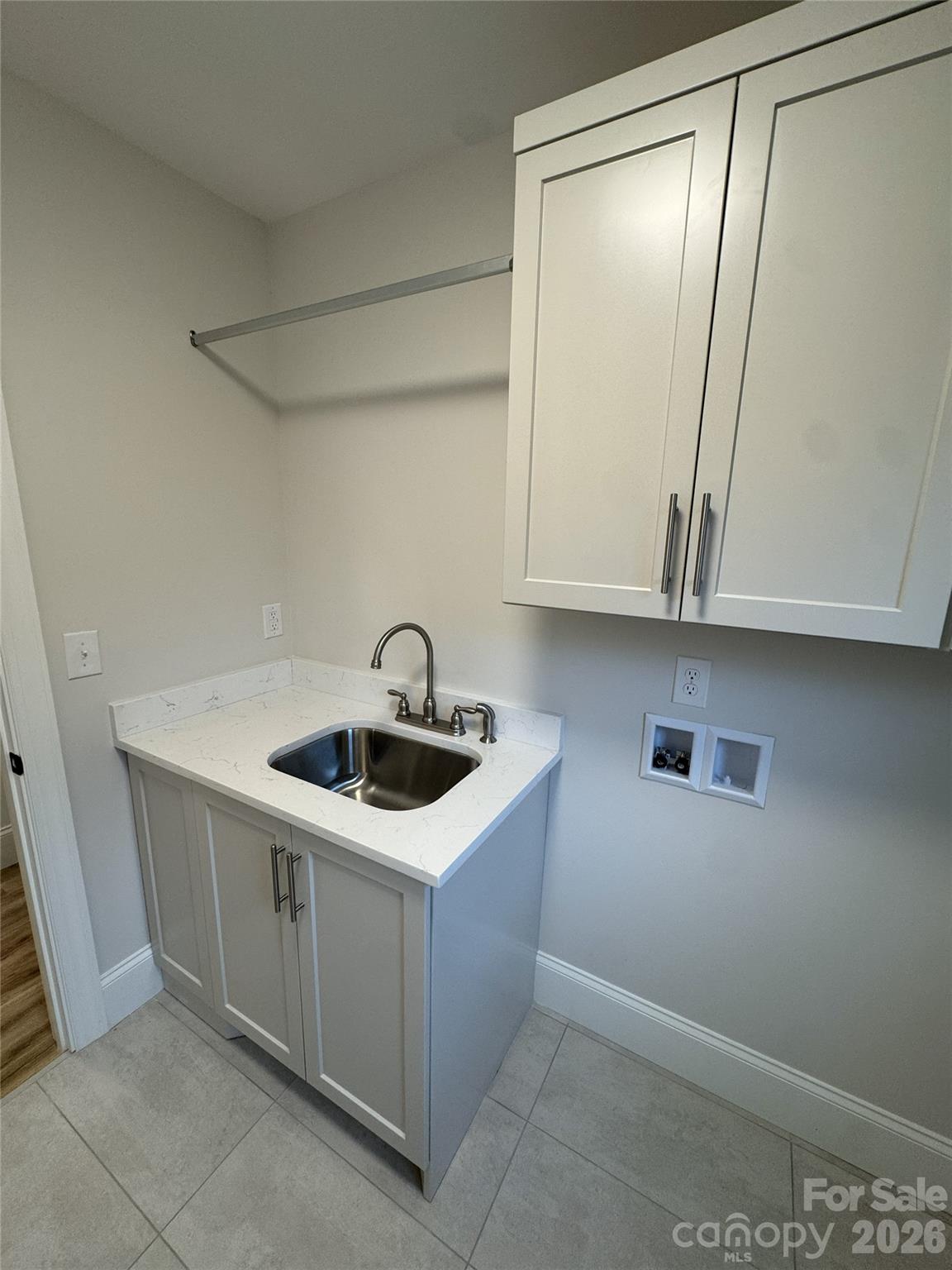 112 Wexford Point, Unit 5 Hickory, NC 28601 - Photo 18 of 47 a kitchen with a sink a stove and cabinets