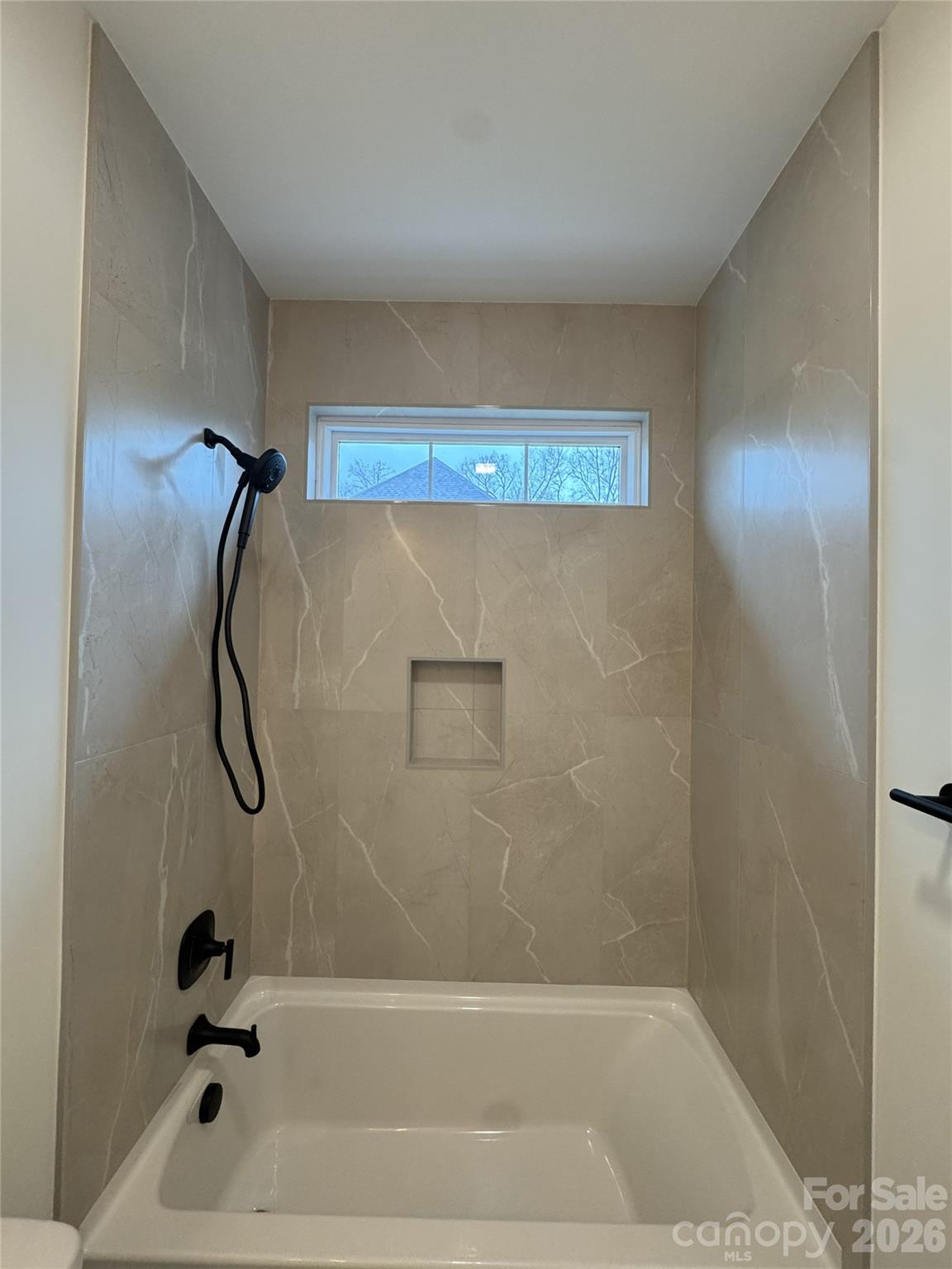 112 Wexford Point, Unit 5 Hickory, NC 28601 - Photo 21 of 47 a bathroom with a bath tub and a shower