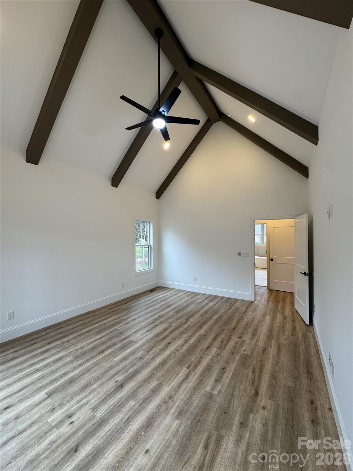 112 Wexford Point, Unit 5 Hickory, NC 28601 - Photo 27 of 47 a view of a livingroom with wooden floor and windows