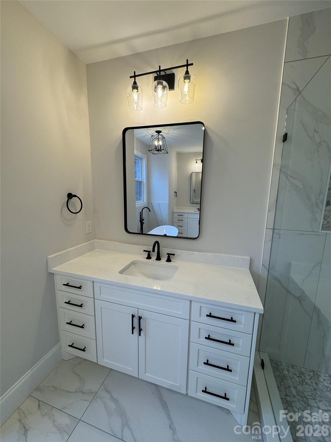 112 Wexford Point, Unit 5 Hickory, NC 28601 - Photo 31 of 47 a bathroom with a sink vanity and mirror