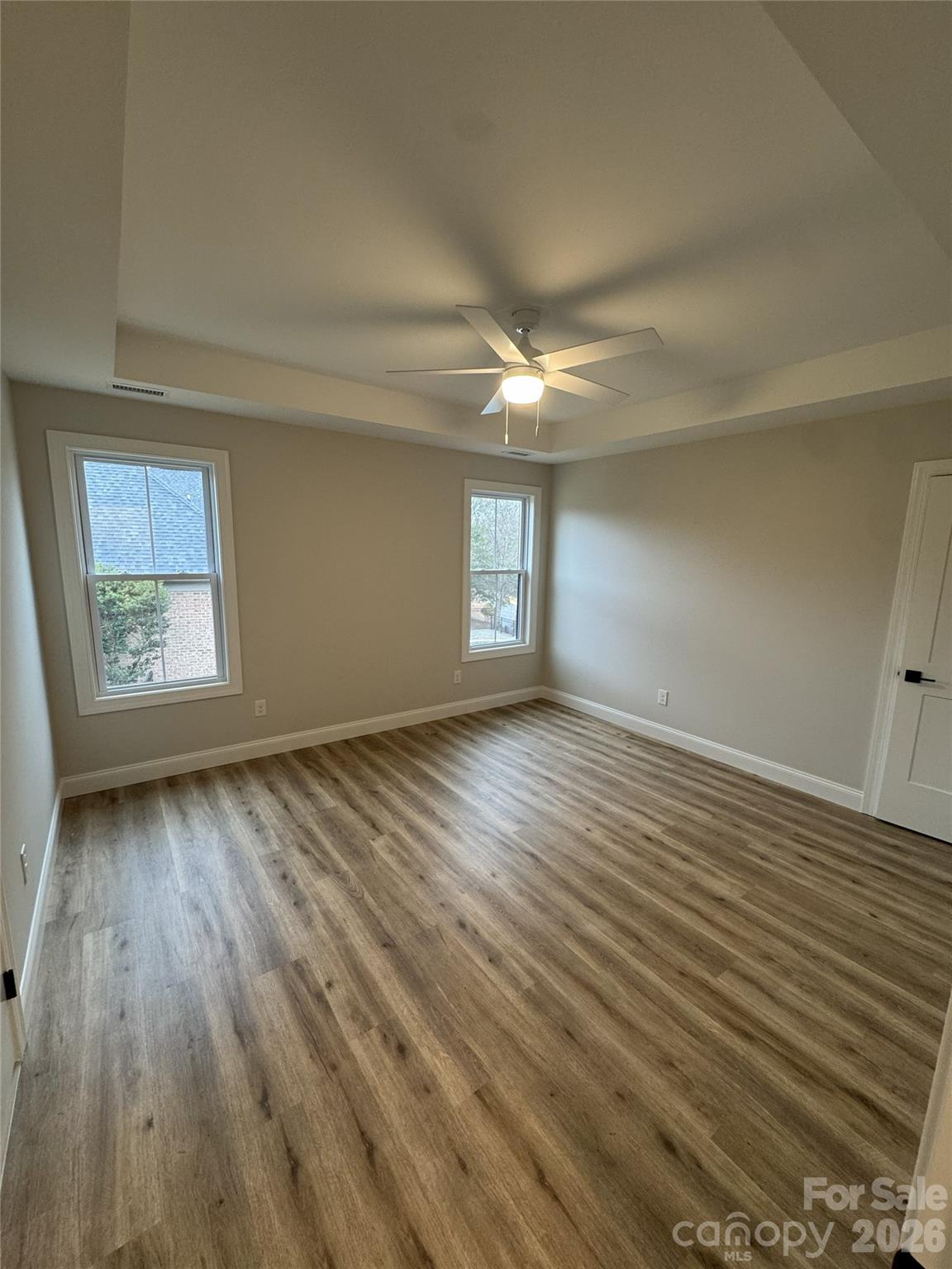 112 Wexford Point, Unit 5 Hickory, NC 28601 - Photo 39 of 47 wooden floor in an empty room with a window