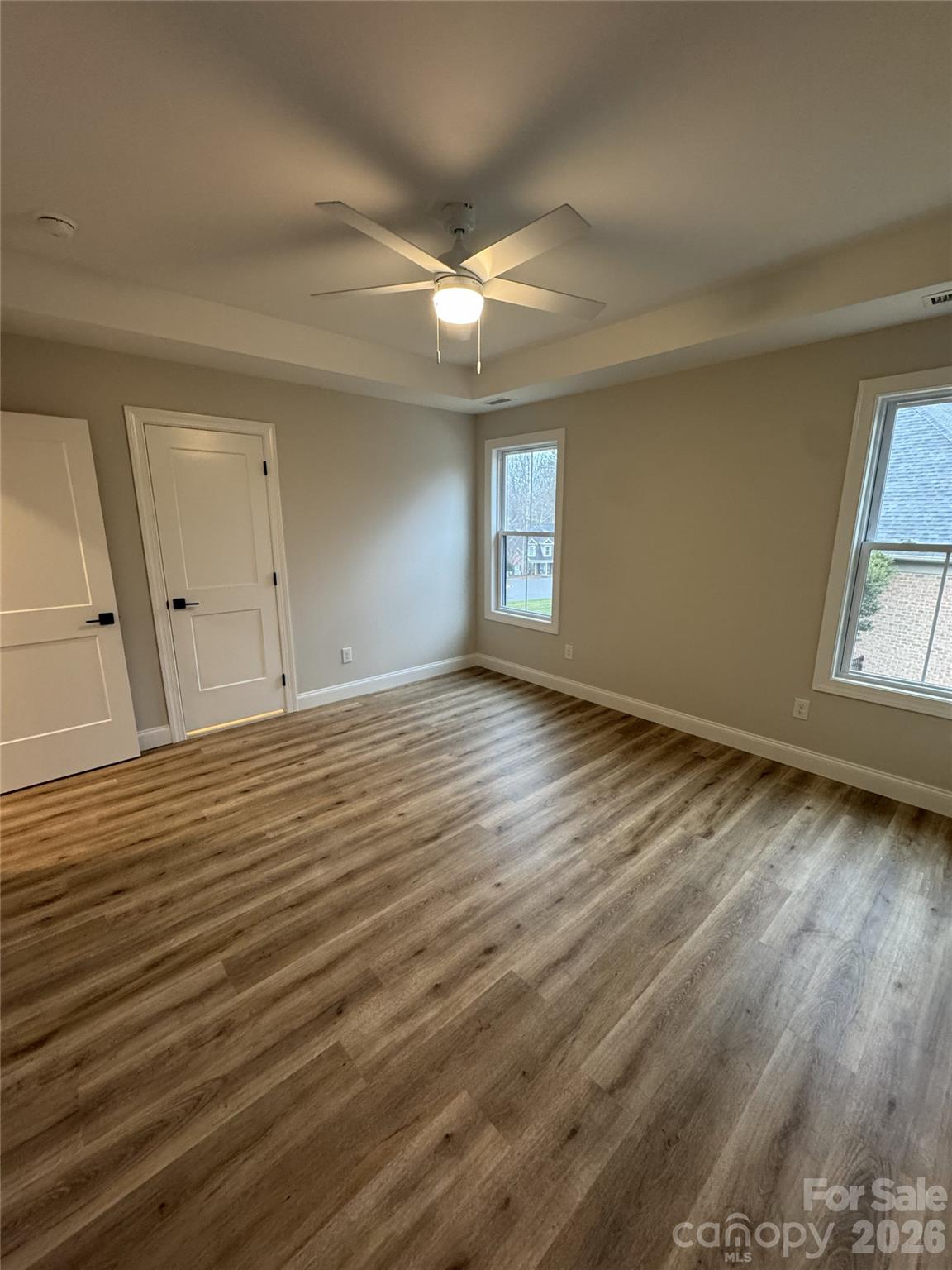 112 Wexford Point, Unit 5 Hickory, NC 28601 - Photo 40 of 47 wooden floor in an empty room with a window