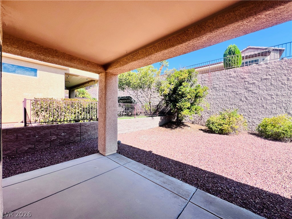 3047 Hickory Valley Road Henderson, NV 89052 - Photo 25 of 33 A spacious covered patio overlooks a private, low-maintenance yard.