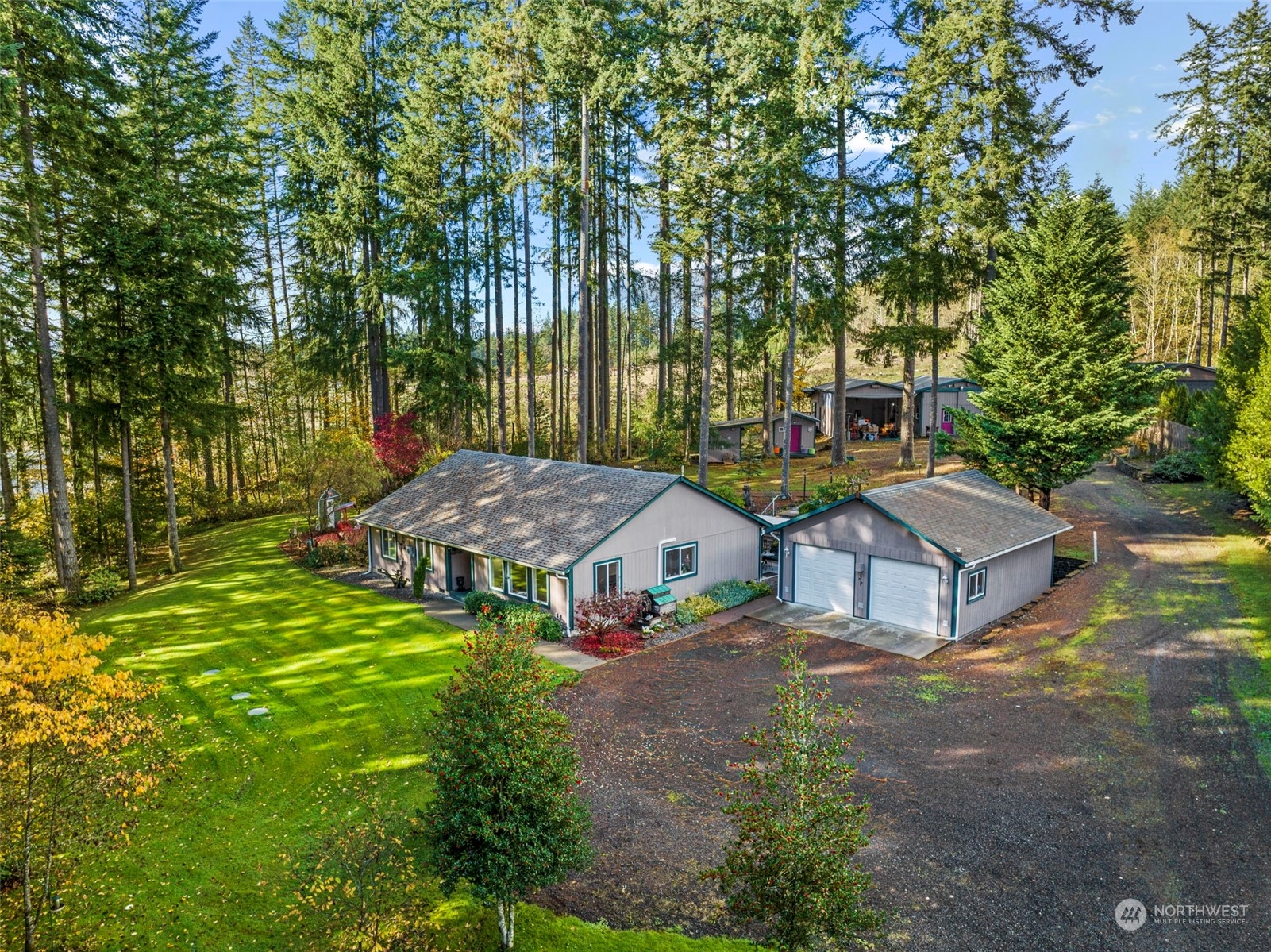 414 D Chilvers Road, Unit D Chehalis, WA 98532 - Photo 1 of 36 a view of yard with swimming pool and trees