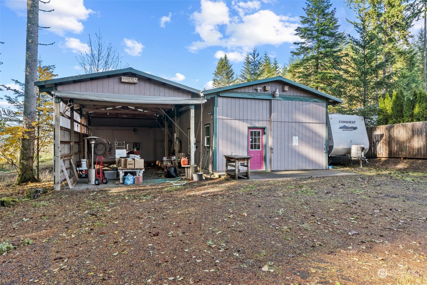414 D Chilvers Road, Unit D Chehalis, WA 98532 - Photo 33 of 36 a view of a car park in front of retail shop