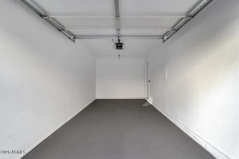 a bathroom with a sink vanity and mirror