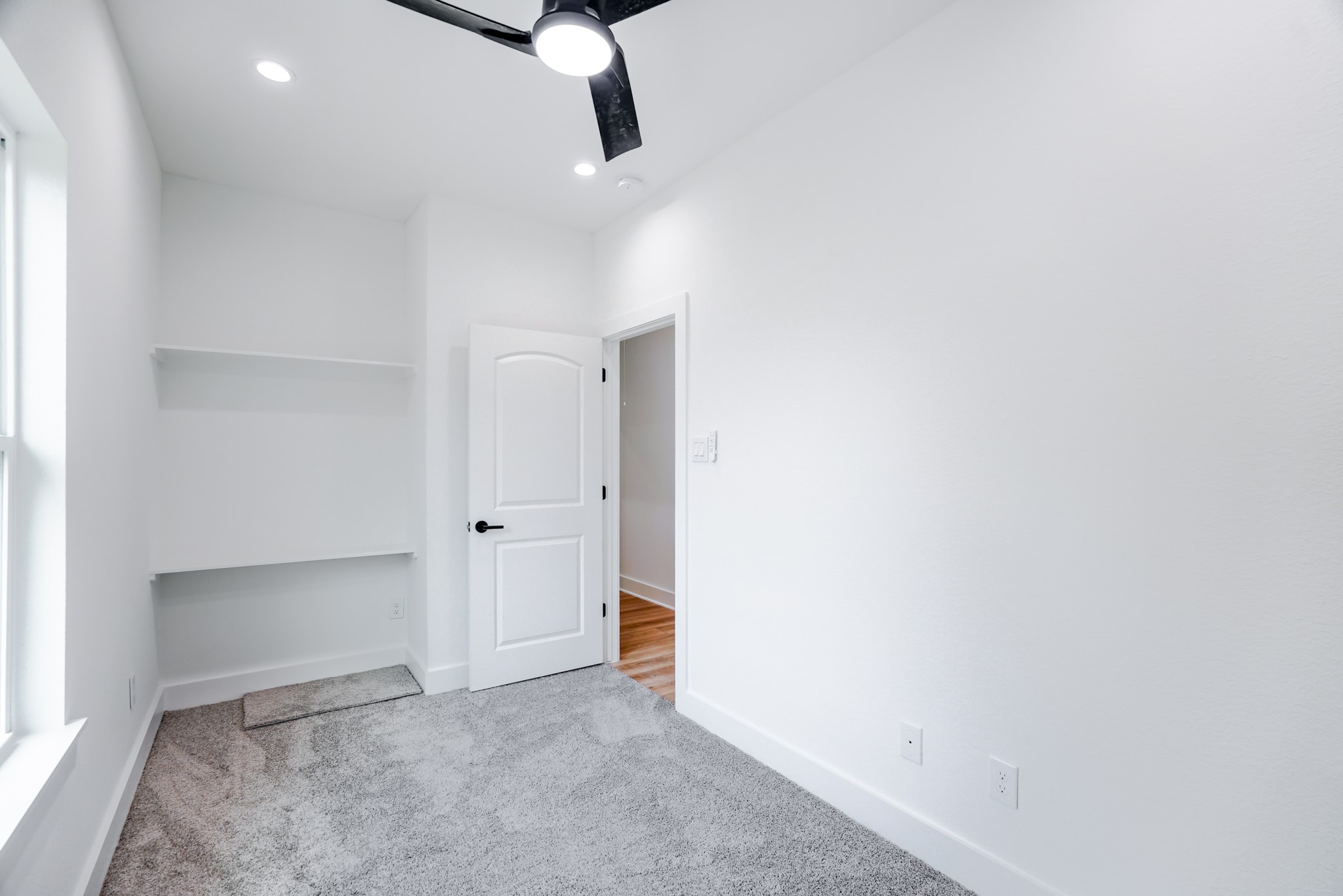 7903 Sunnyhill Street Houston, TX 77088 - Photo 26 of 33 a view of an empty room