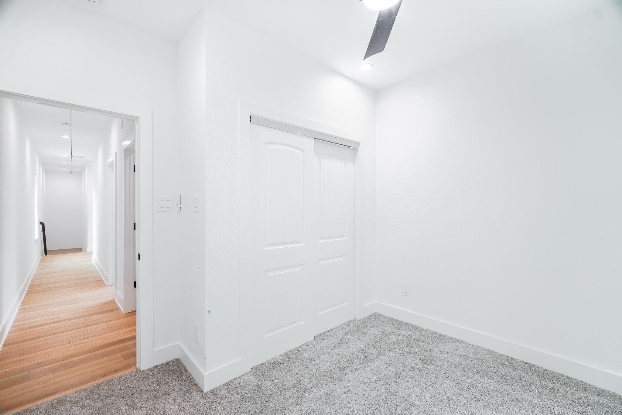 7903 Sunnyhill Street Houston, TX 77088 - Photo 29 of 33 a view of a room with wooden floor