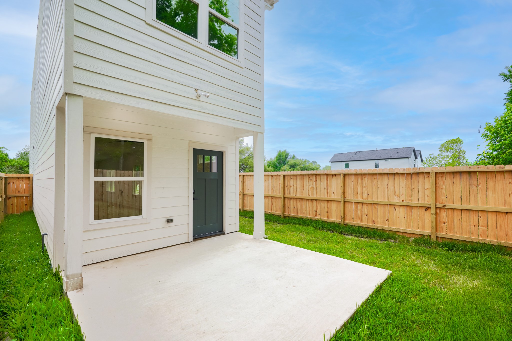 7903 Sunnyhill Street Houston, TX 77088 - Photo 33 of 33 a view of a backyard with wooden fence