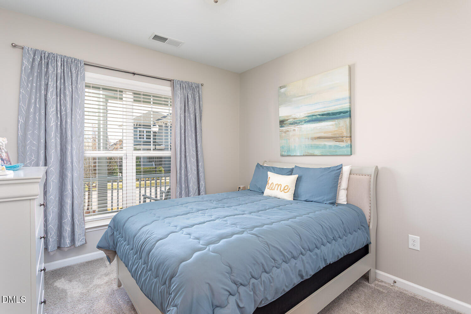 1708 Highpoint Street Wake Forest, NC 27587 - Photo 18 of 63 a bedroom with a large bed and a large window