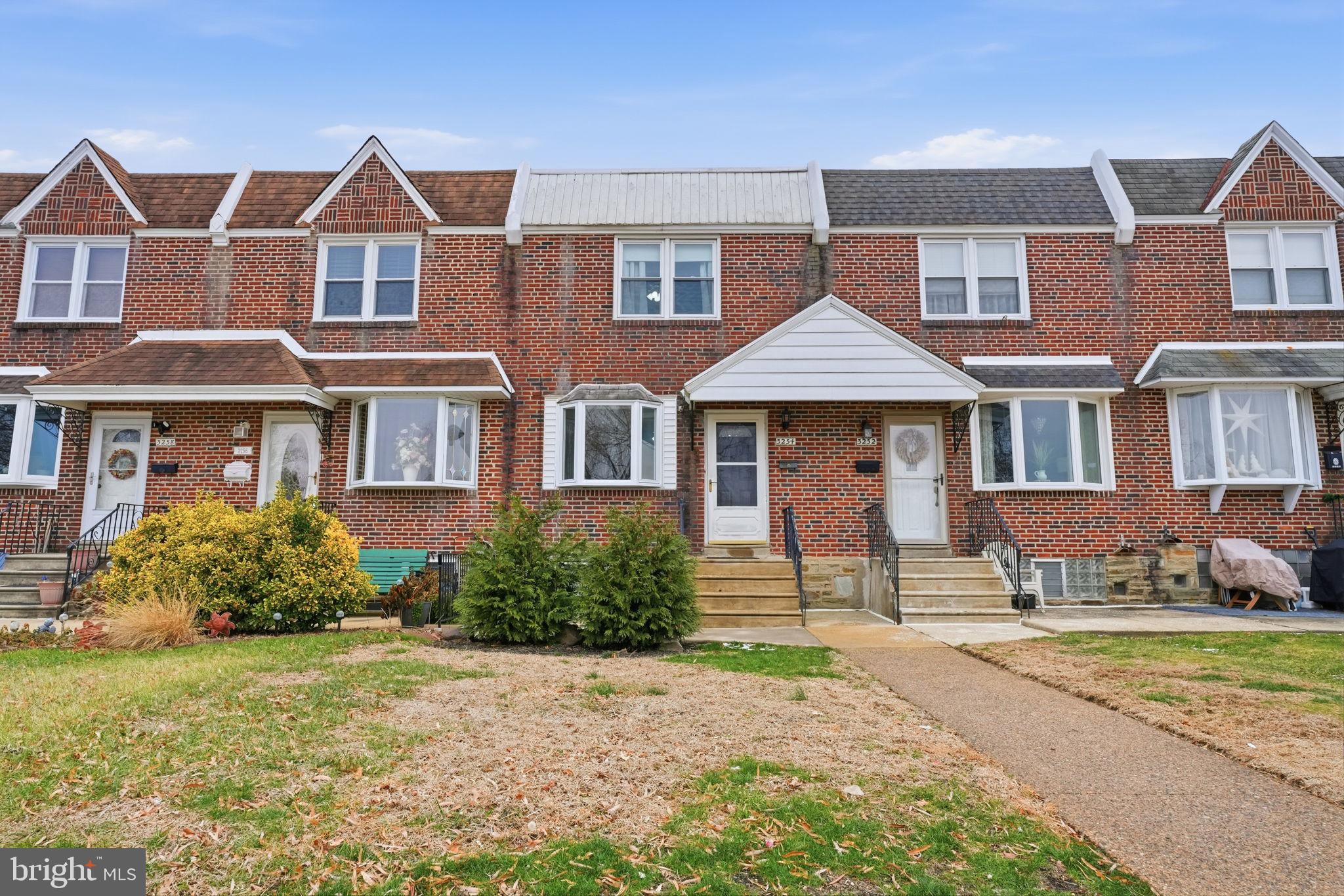 3254 Fordham Road Philadelphia, PA 19114 - Photo 1 of 25 a front view of a house with a yard