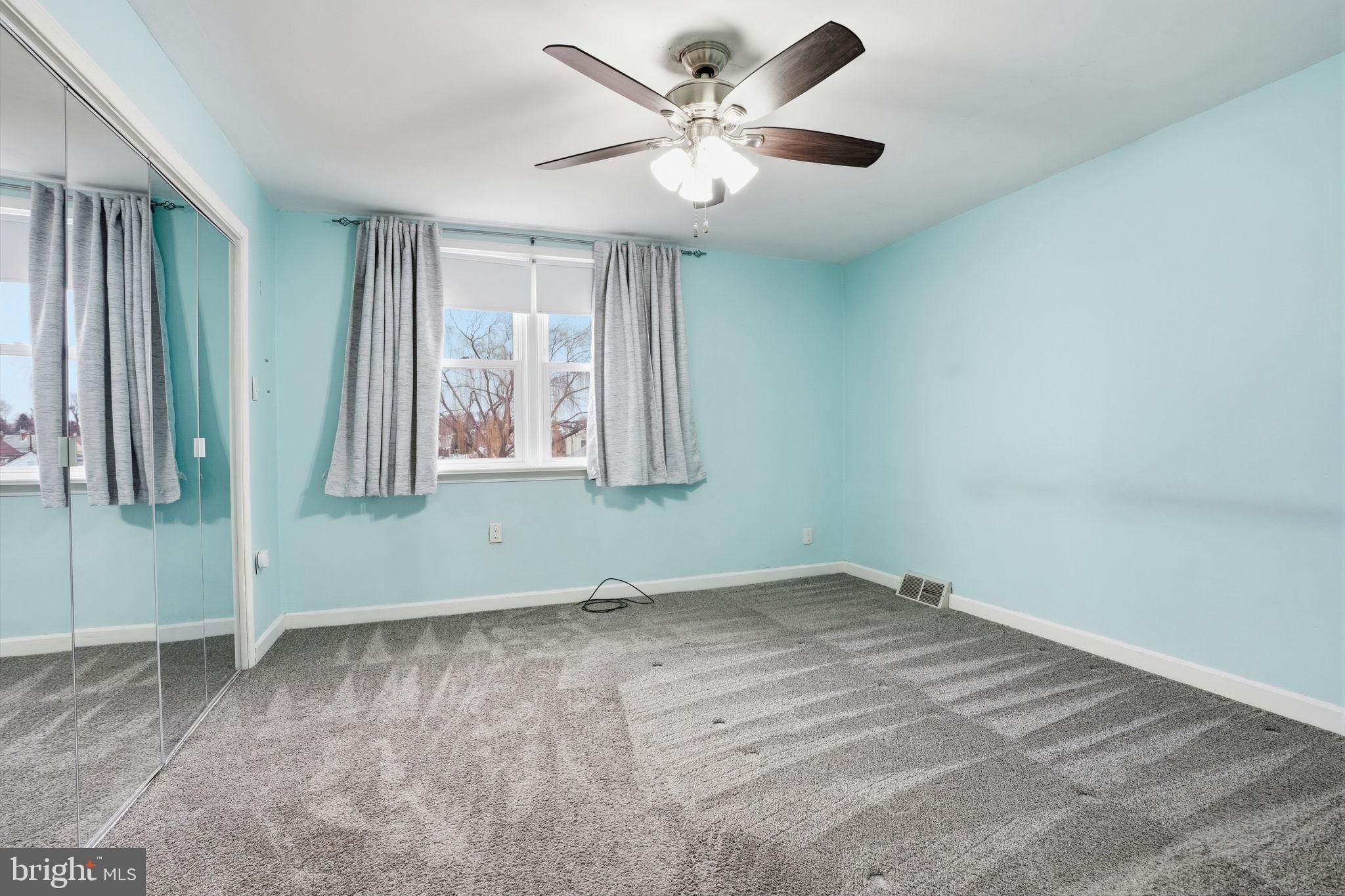 3254 Fordham Road Philadelphia, PA 19114 - Photo 16 of 25 an empty room with windows and fan