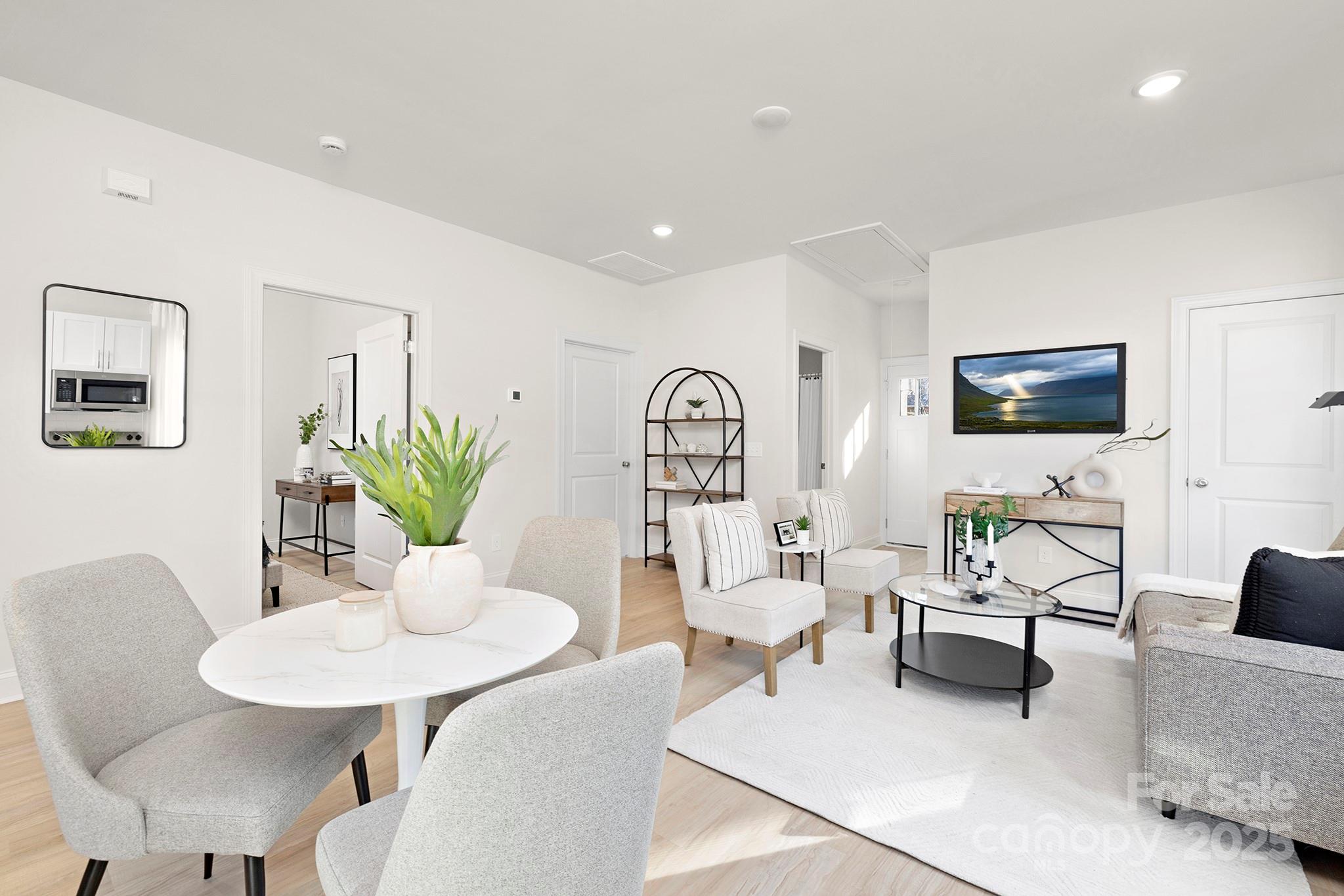 1124 Butler Street Salisbury, NC 28144 - Photo 11 of 19 a living room with furniture and a flat screen tv