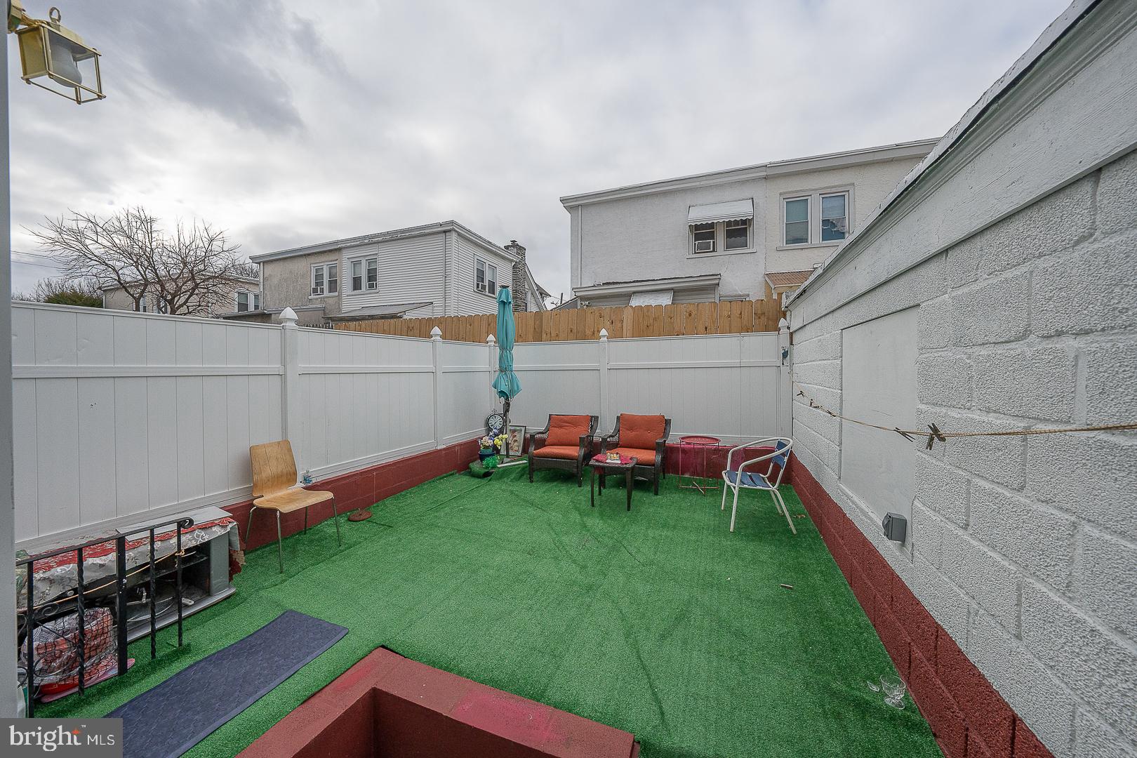 172 Marlborough Road Upper Darby, PA 19082 - Photo 54 of 56 a view of backyard with a table and chair