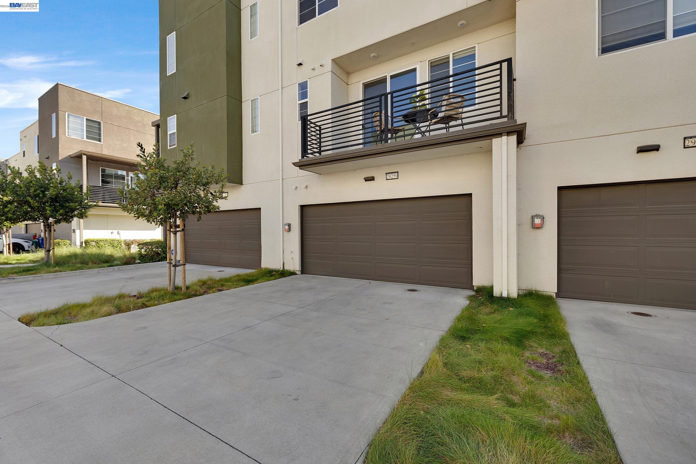 29259 Hub Court Hayward, CA 94544 - Photo 26 of 34 a front view of a house with a yard and garage