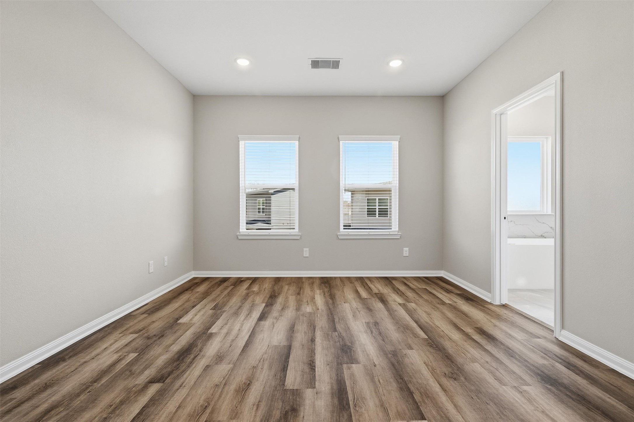9906 Clark Road Houston, TX 77076 - Photo 13 of 50 a view of room with window and hardwood floor
