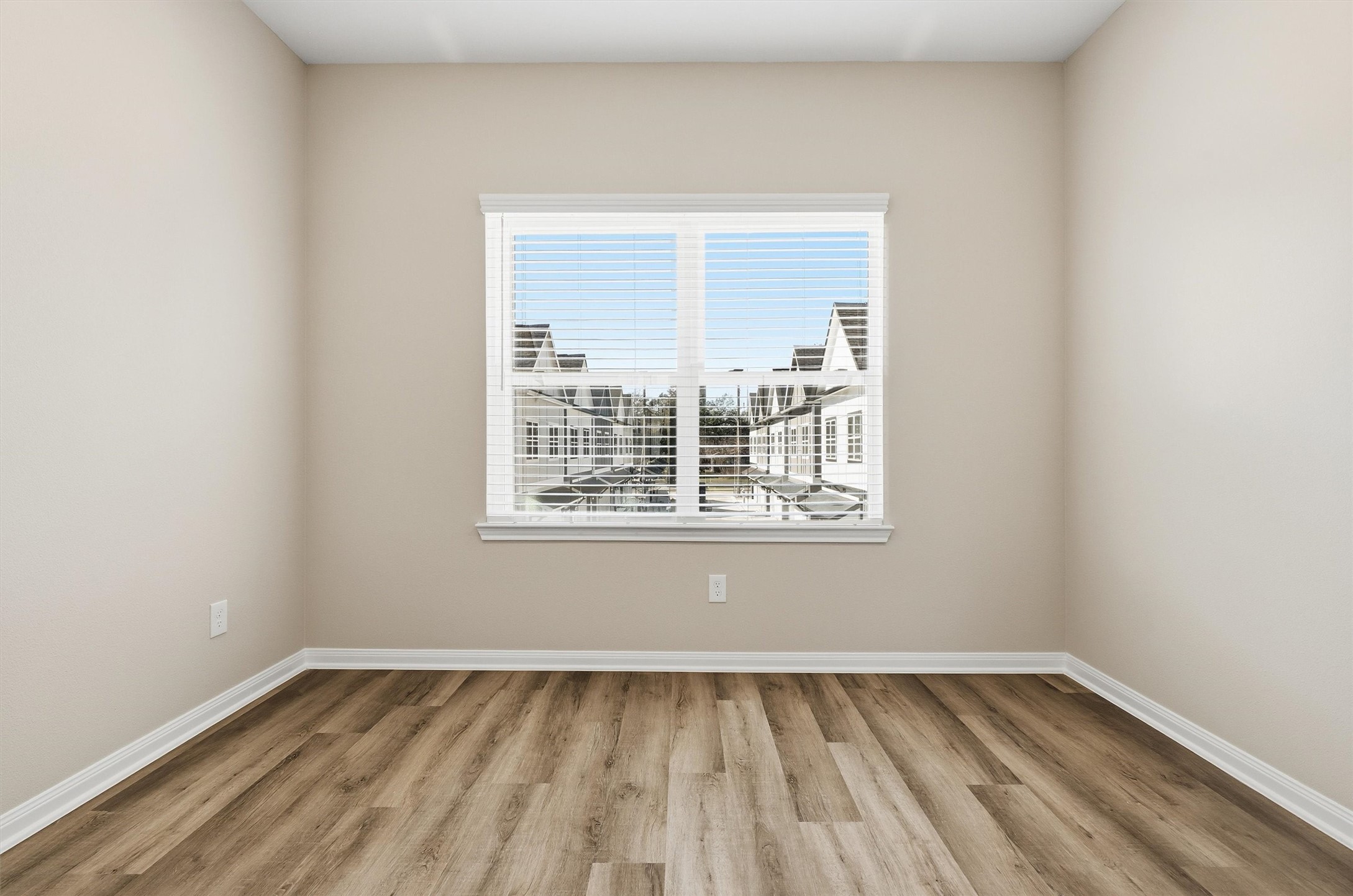 9906 Clark Road Houston, TX 77076 - Photo 32 of 50 an empty room with a window