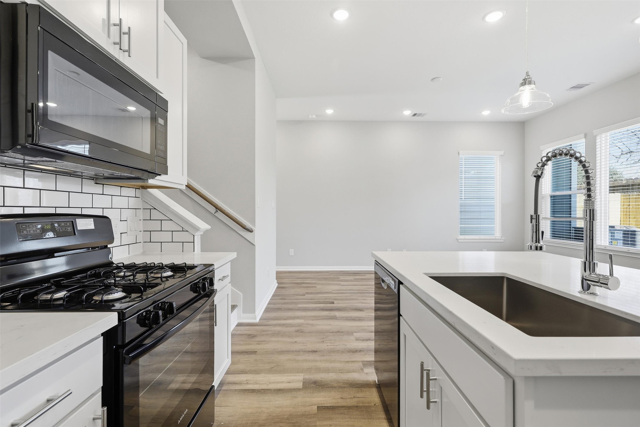 9906 Clark Road Houston, TX 77076 - Photo 6 of 50 a kitchen that has a sink and a stove