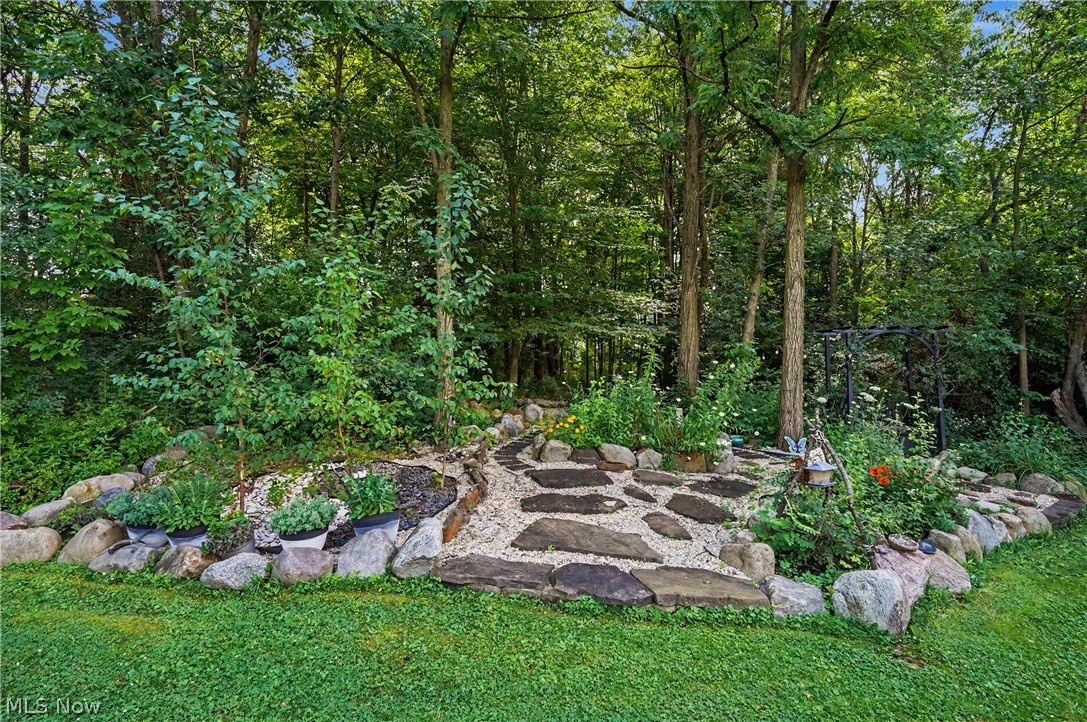 952 Ravenna Road Kent, OH 44240 - Photo 23 of 37 Beautifully landscaped rock garden area to relax and enjoy with access to paths.