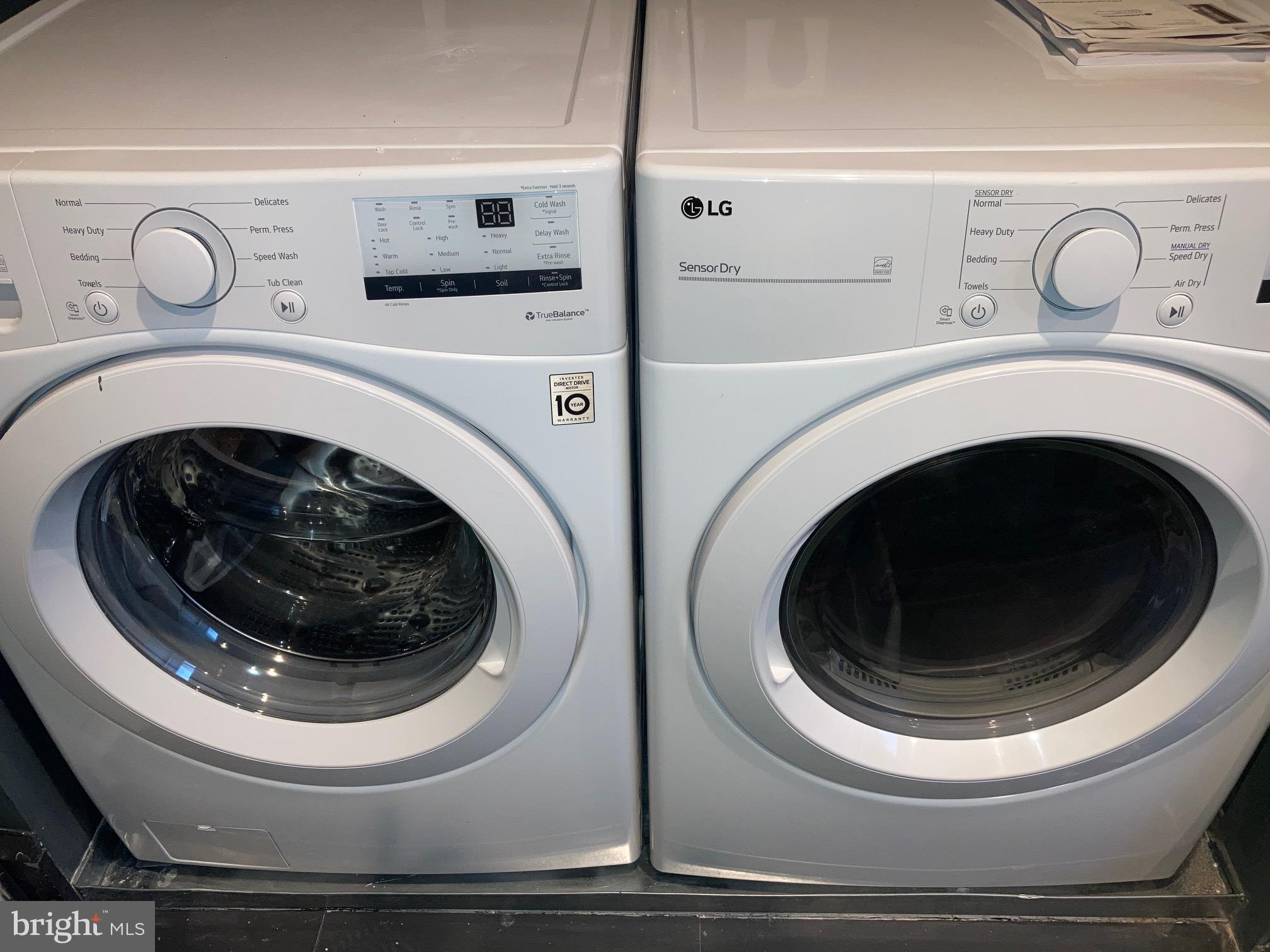 1108 Pine Street, Unit 3F Philadelphia, PA 19107 - Photo 8 of 10 a utility room with dryer and washer