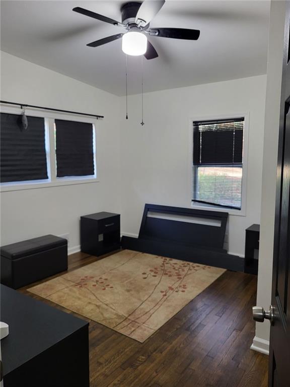 Undisclosed Address Decatur, GA 30032 - Photo 14 of 25 a living room with furniture and a wooden floor