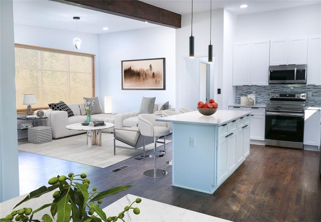 Undisclosed Address Decatur, GA 30032 - Photo 24 of 25 a kitchen with stainless steel appliances kitchen island granite countertop a stove a sink and a microwave