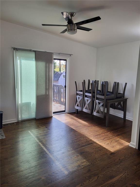Undisclosed Address Decatur, GA 30032 - Photo 10 of 25 a view of a livingroom with furniture and a ceiling fan
