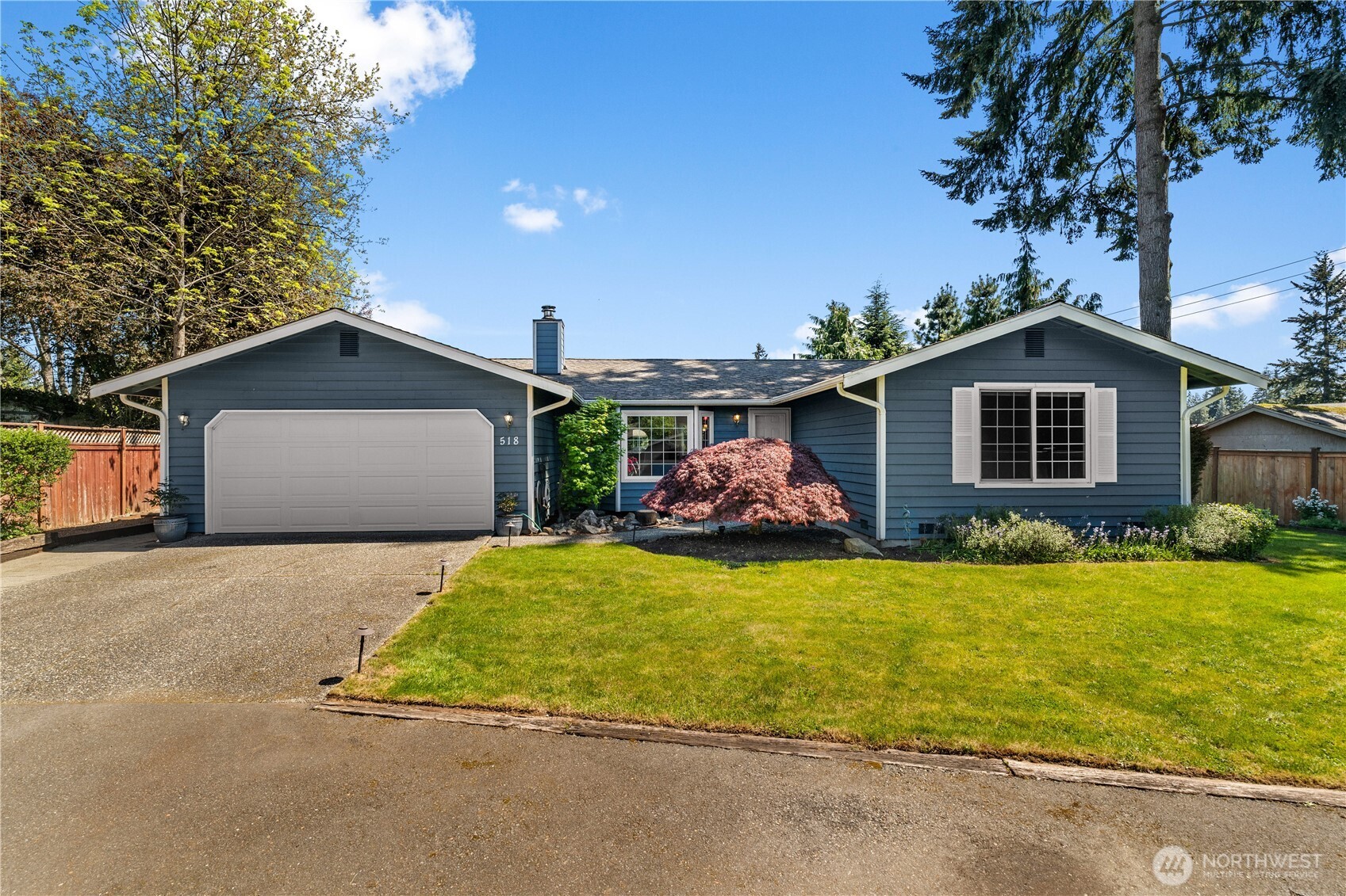 518 Hubbard Road Lynnwood, WA 98036 - Photo 1 of 39 a front view of a house with a garden and yard