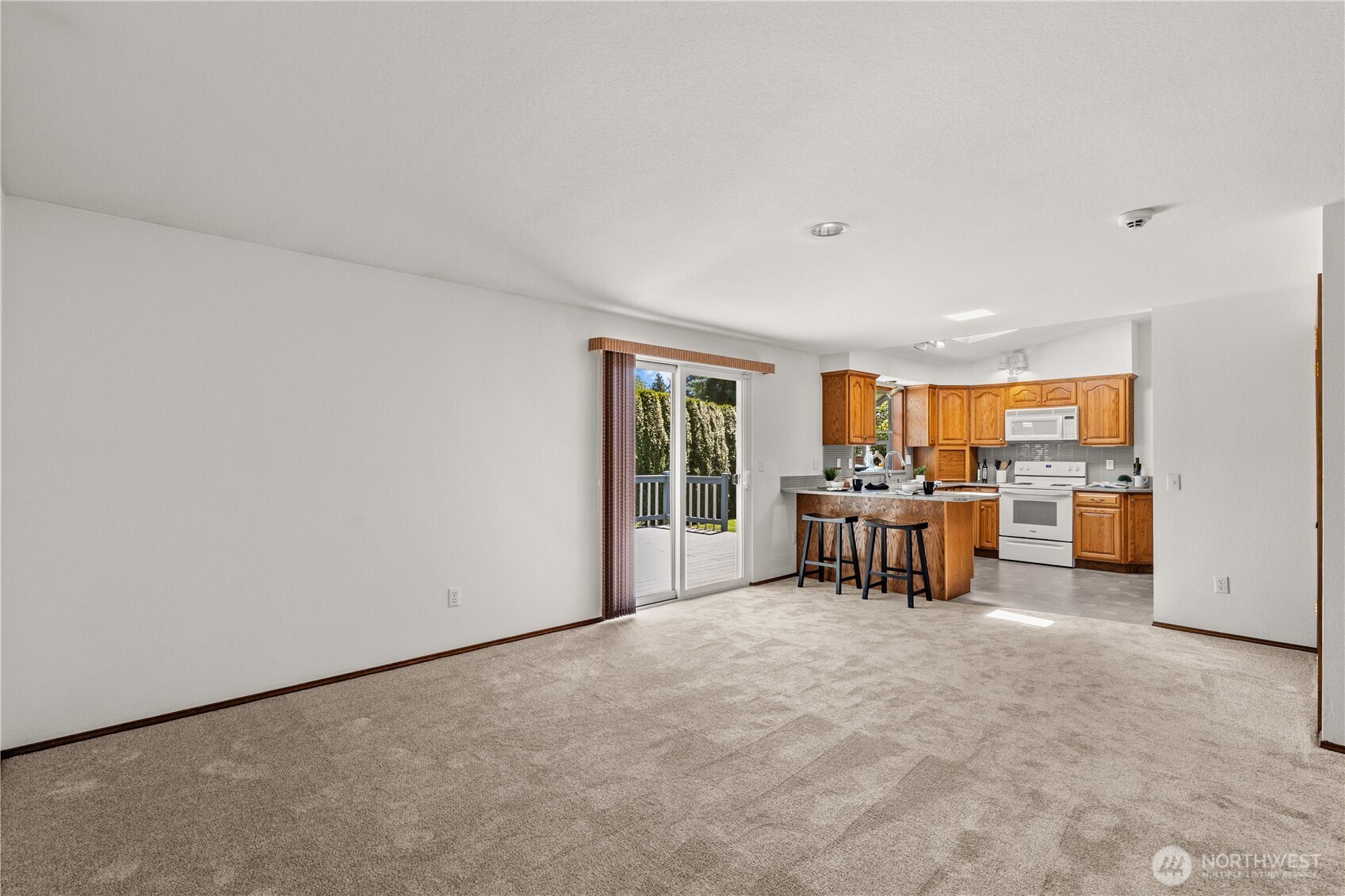518 Hubbard Road Lynnwood, WA 98036 - Photo 13 of 39 a living room with furniture and a table