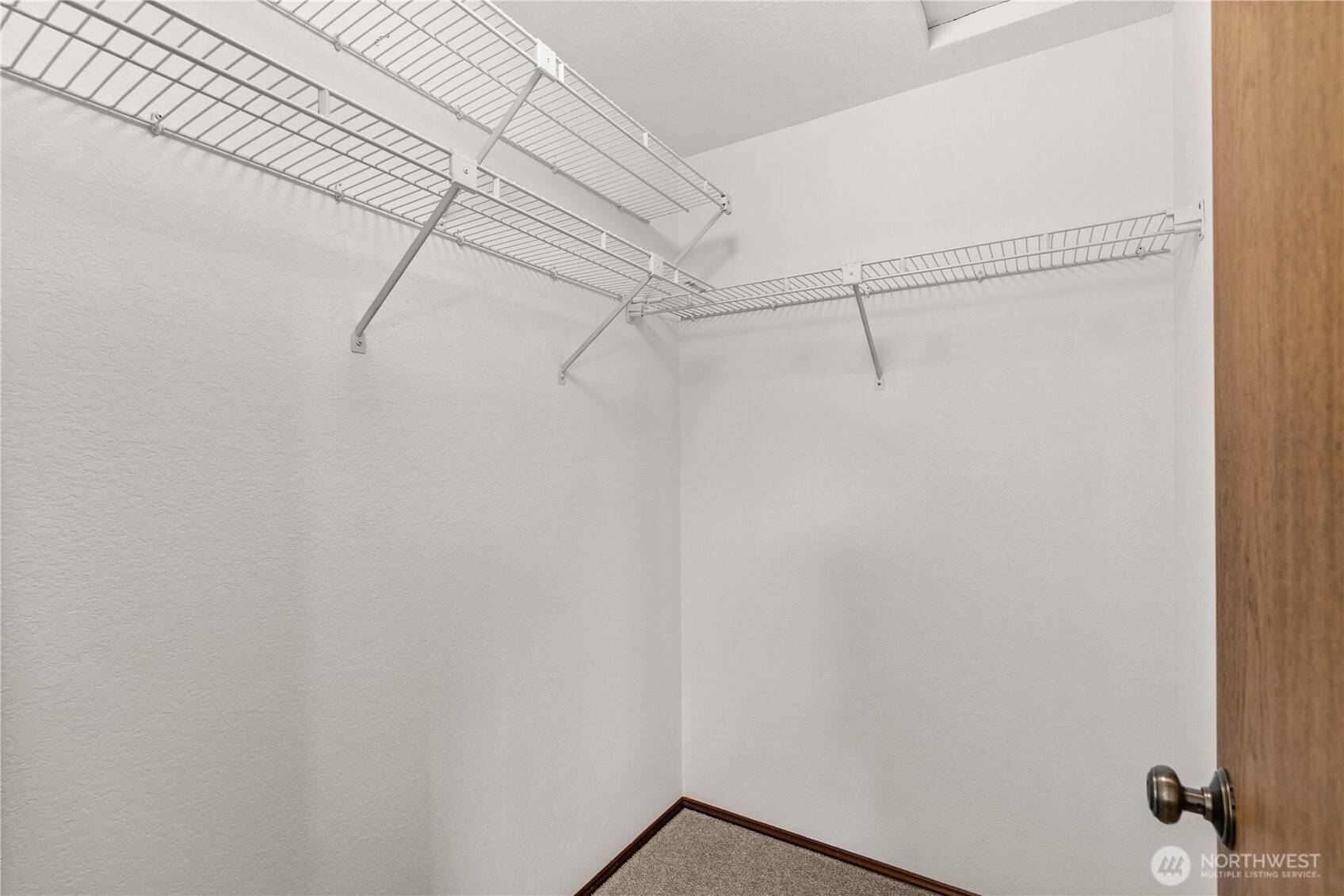 518 Hubbard Road Lynnwood, WA 98036 - Photo 18 of 39 a view of small space with racks on the wall