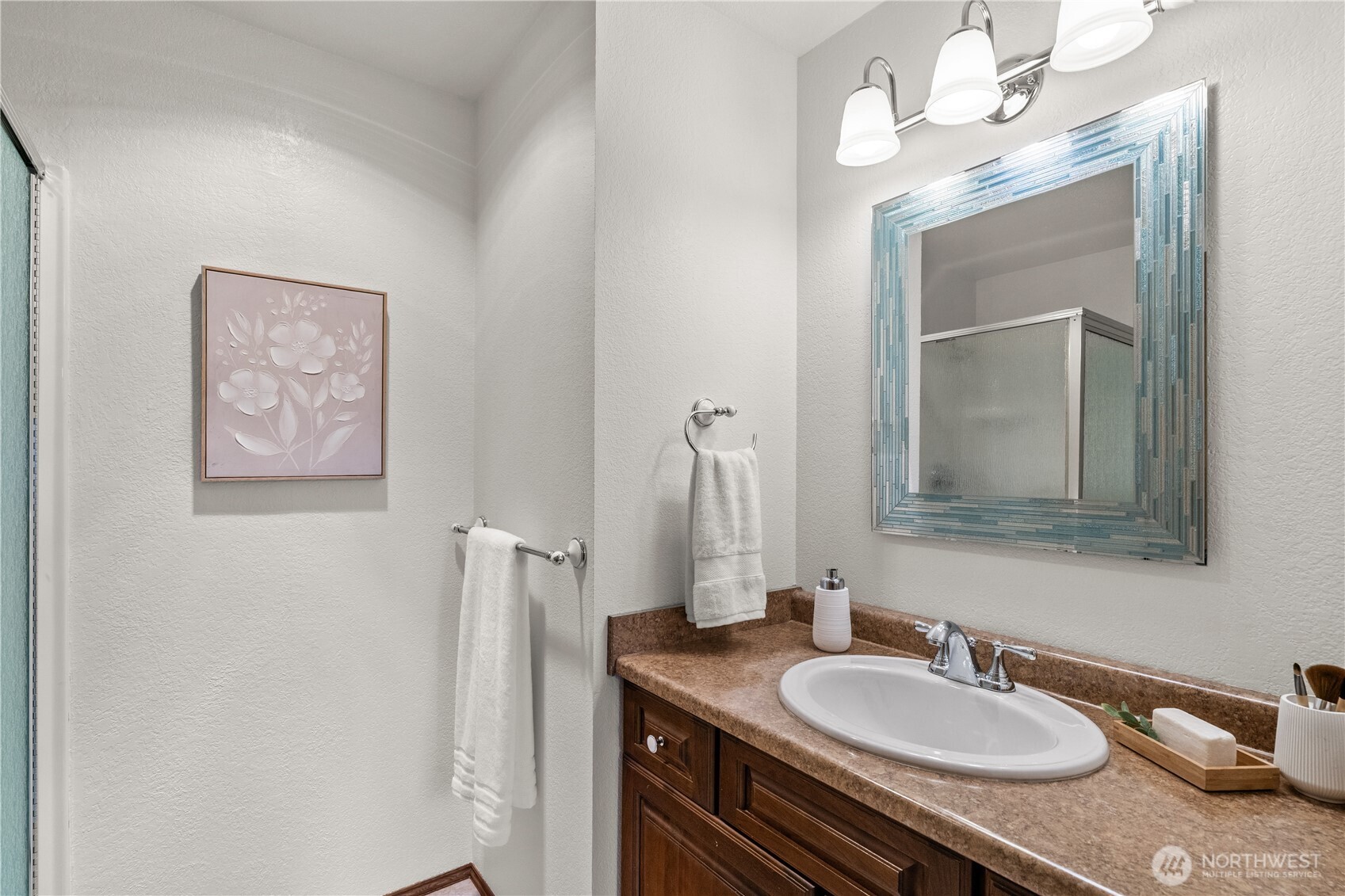 518 Hubbard Road Lynnwood, WA 98036 - Photo 20 of 39 a bathroom with a granite countertop sink and a mirror