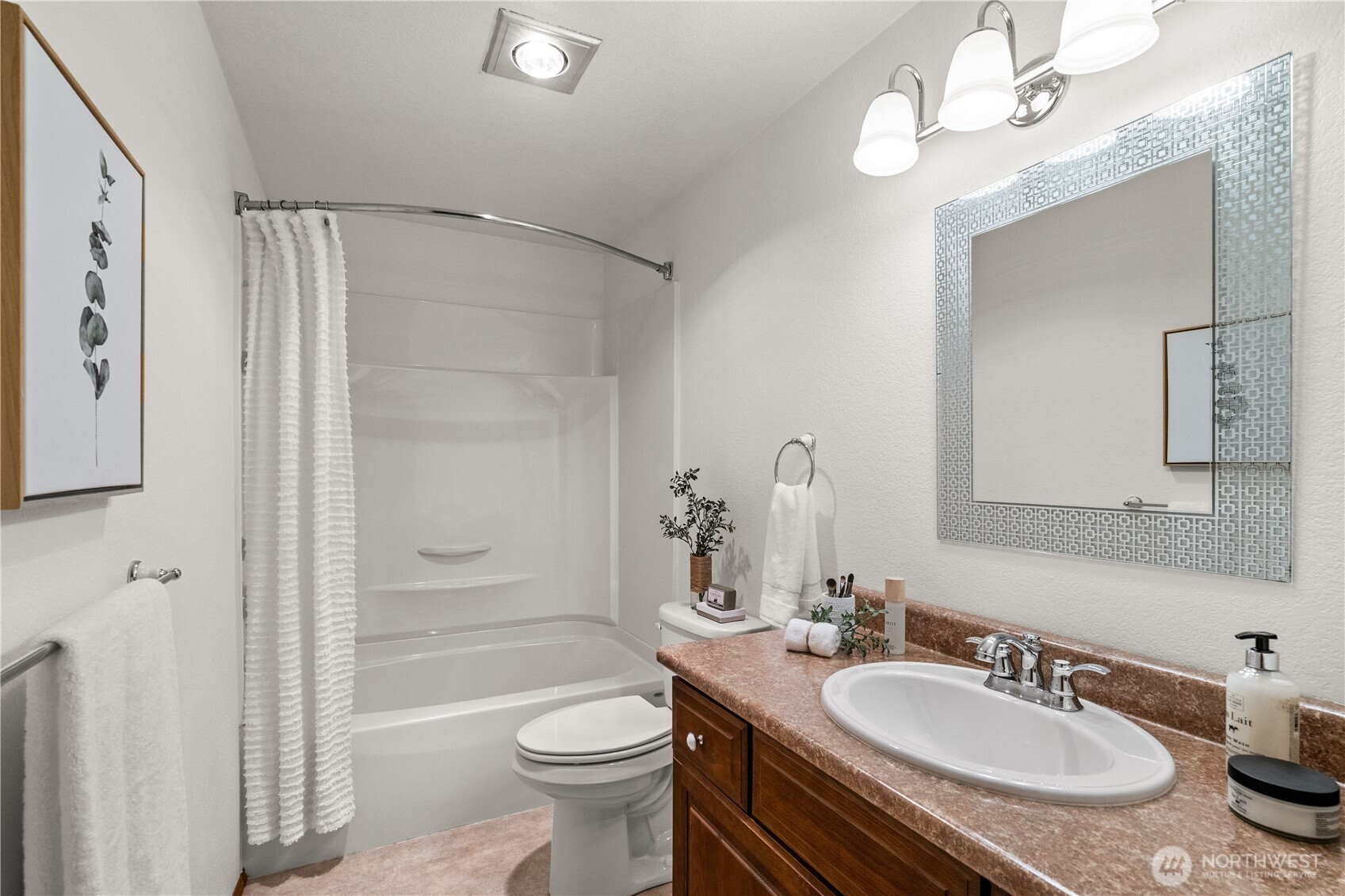 518 Hubbard Road Lynnwood, WA 98036 - Photo 25 of 39 a bathroom with a granite countertop sink a toilet a mirror and shower